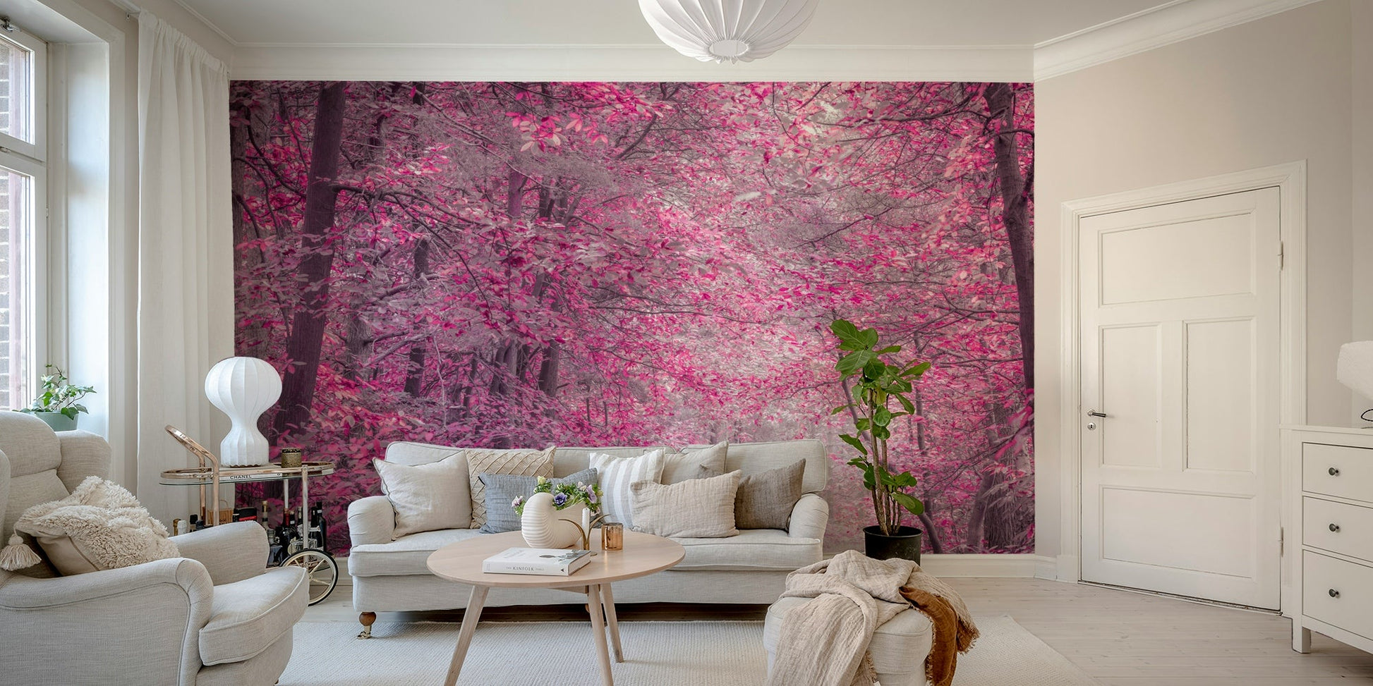 A wall mural depicting a forest path lined with trees and foliage.
