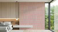 Classic gingham wallpaper featuring gentle rose and white checks in a repeating grid.