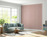 Rosewater Gingham wallpaper featuring a soft pink checkered pattern with a classic charm.