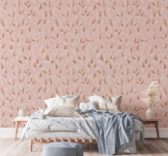 Whimsical Lily Valley Dance wallpaper in soft pink with cream swirls behind a wood-frame bed in a bedroom
