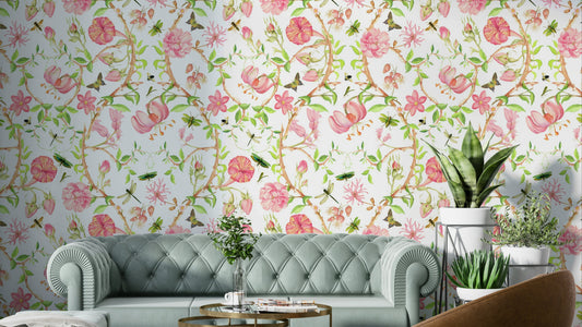 Close-up of soft flowers and birds in a watercolor wallpaper design.

