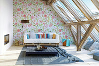 Botanical wall mural with pastel florals and detailed branches.

