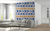 Artistic crossed brushstroke pattern creating a dynamic abstract mural.