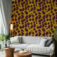 A bedroom with the floral mural behind the headboard.

