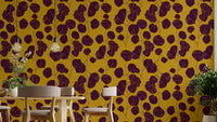 A contemporary living room with a boho floral wall mural.

