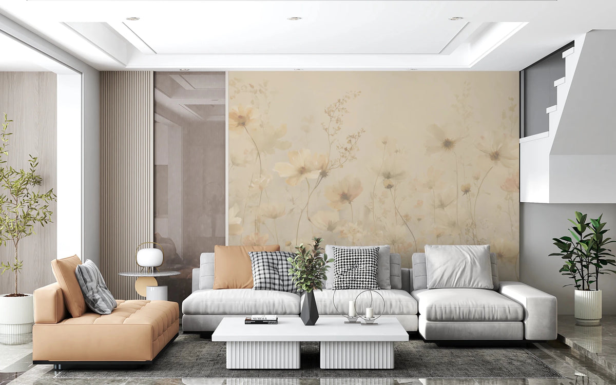 Poetic Soft Floral Honey wallpaper mural of warm cream flowers in a living room with a grey sofa and a tan chaise