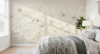 Poetic Soft Floral Linen wallpaper mural of soft neutral flowers in a bedroom with white bedding and a macrame throw