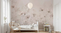 Poetic Soft Floral Petal Dust wallpaper mural of soft pink wildflowers in a kids bedroom with a white bed and rattan chair