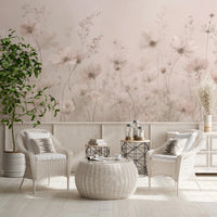 Poetic Soft Floral Petal Dust wallpaper mural of blush flowers in a sunroom with white wicker chairs and an ottoman