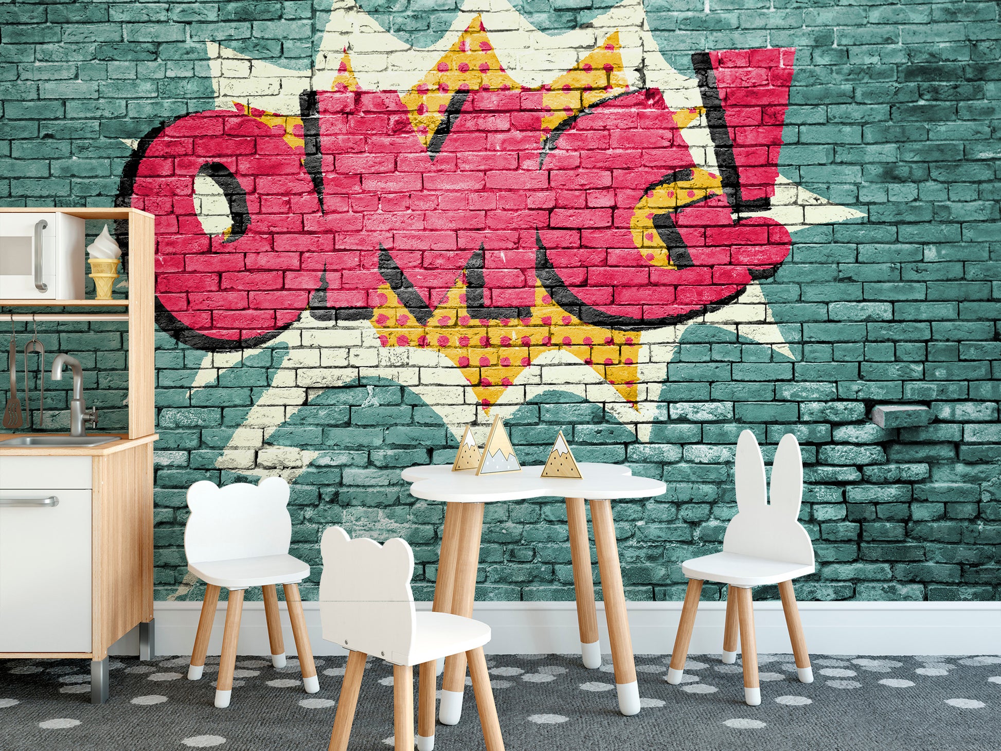 Pop Art OMG Graffiti wallpaper mural on teal brick in a kids room with white bunny chairs and a play kitchen