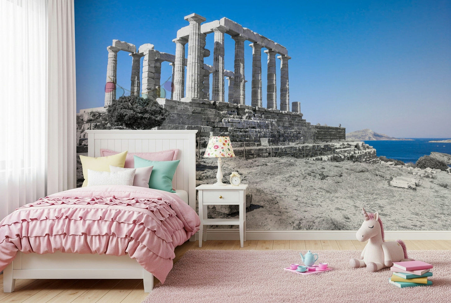 This wallpaper offers a panoramic view of the Poseidon Temple framed by clear blue skies and distant islands.