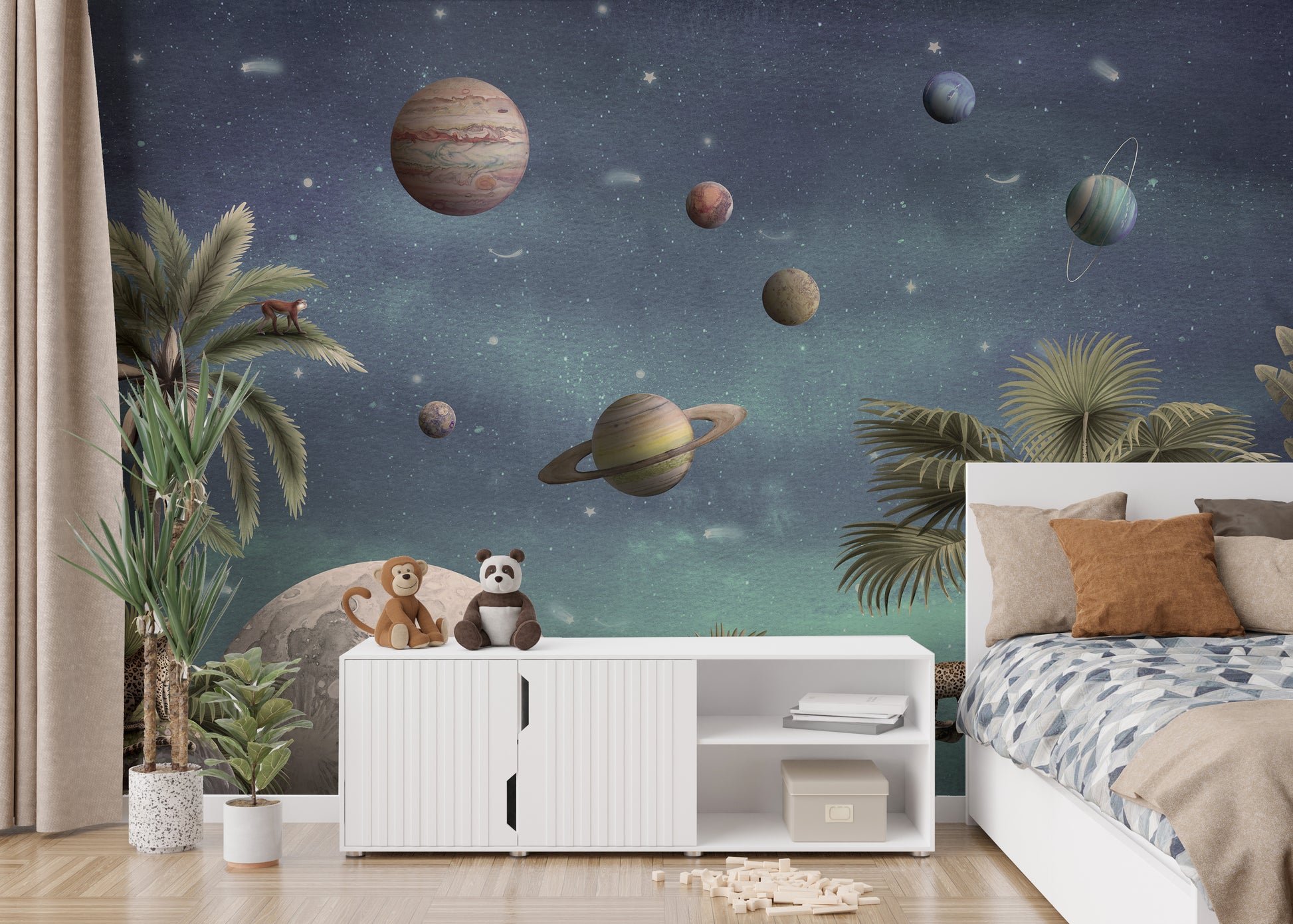 Pretty Planets wallpaper mural with Saturn and planets beside a white bed and sideboard in a kids bedroom