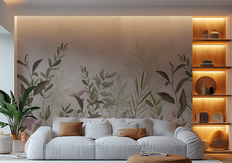 Pristine Haven wallpaper mural with green botanical leaves behind a white sofa and lit wooden shelves in a living room