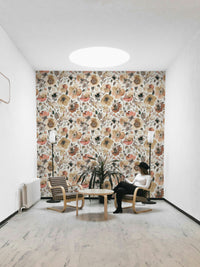 Retro floral mural with large poppies in orange, coral, and yellow.

