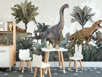 Jurassic Journey wallpaper mural of dinosaurs and foliage behind a toy kitchen and white bear-shaped chairs in a kids room