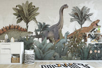 Jurassic Journey wallpaper mural of dinosaurs among ferns behind a white sideboard and striped basket in a kids room