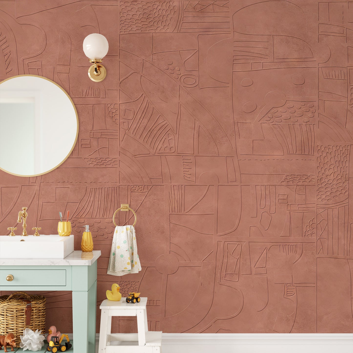 Mystic Terracotta wallpaper mural with etched abstract shapes in a kids bathroom with a green vanity and round mirror