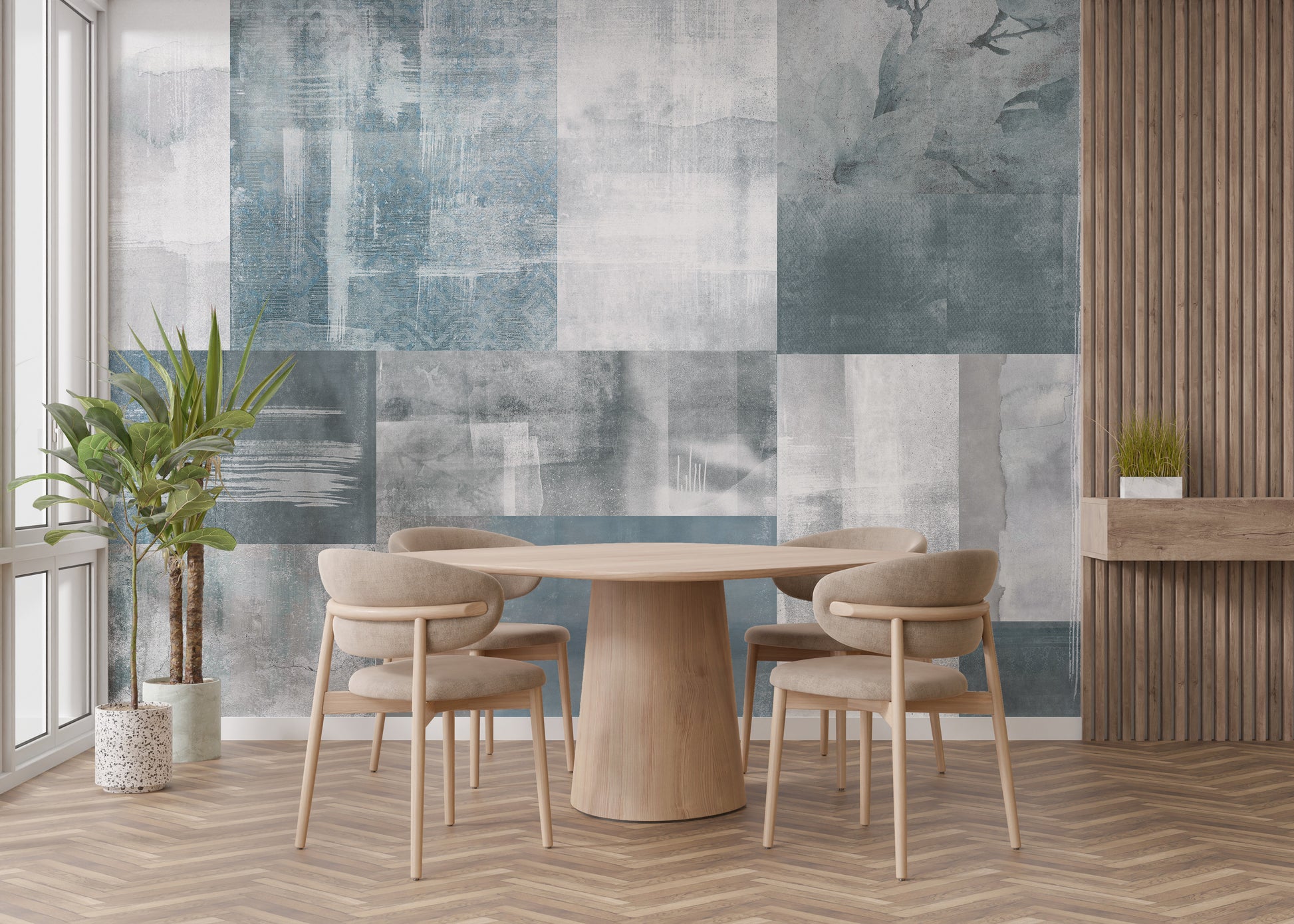 Vintage Elegance wallpaper mural in muted blue patchwork behind a round wood table and beige chairs in a dining room