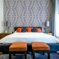 The mural is created for an entire wall, providing a unique backdrop.
