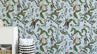 Rabbit and owl among leaves mural design
