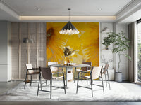 An artistic gold flower mural on minimalist wallpaper.

