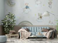 The design features soft, pastel-colored rainbows and clouds.

