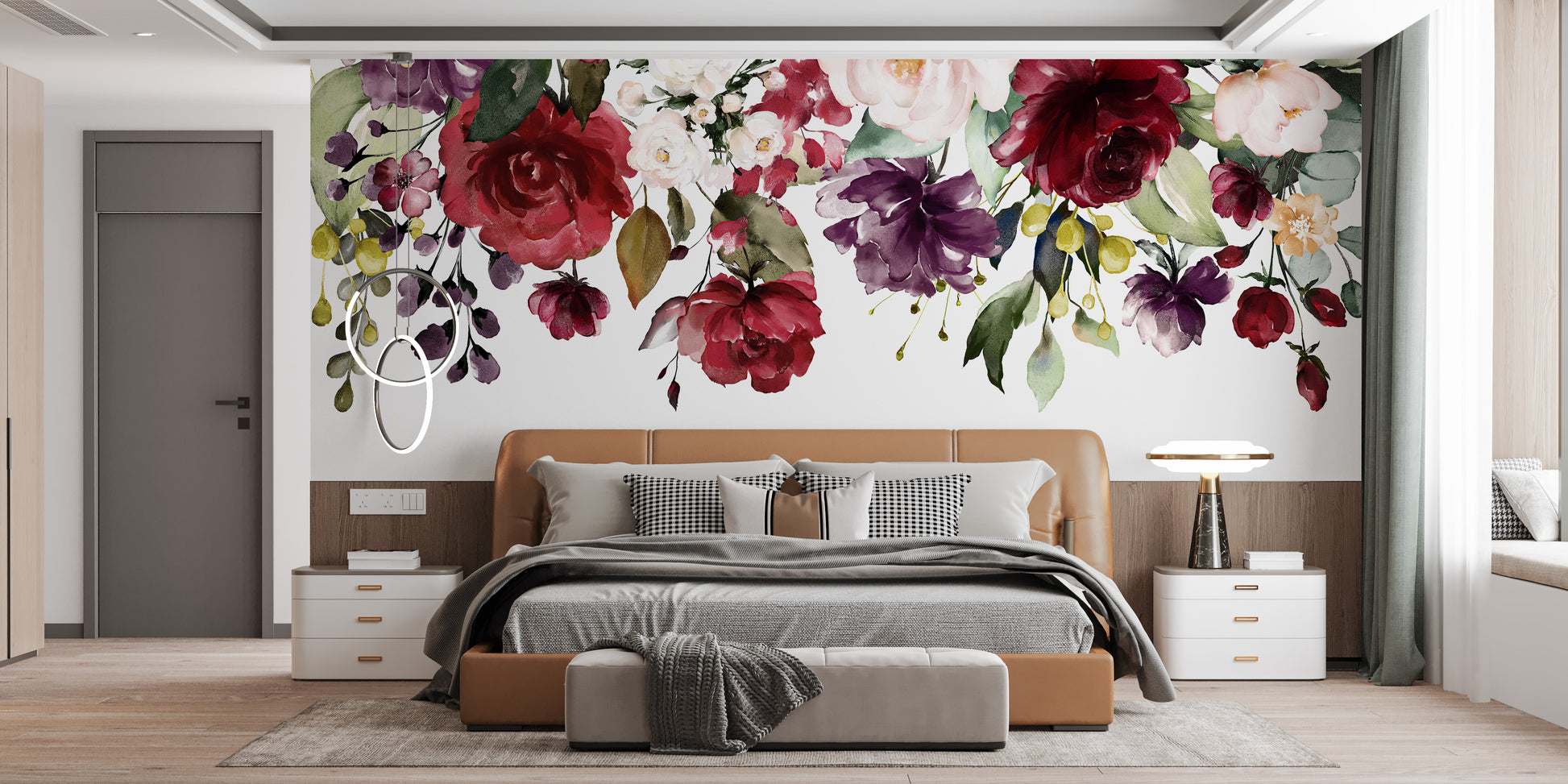 Red and Pink Floral wallpaper mural of hanging blooms above a tan leather bed in a bedroom