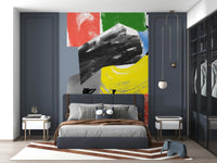 An abstract wallpaper featuring bold red, blue, green, yellow, and black brushstrokes in a dynamic modern composition.
