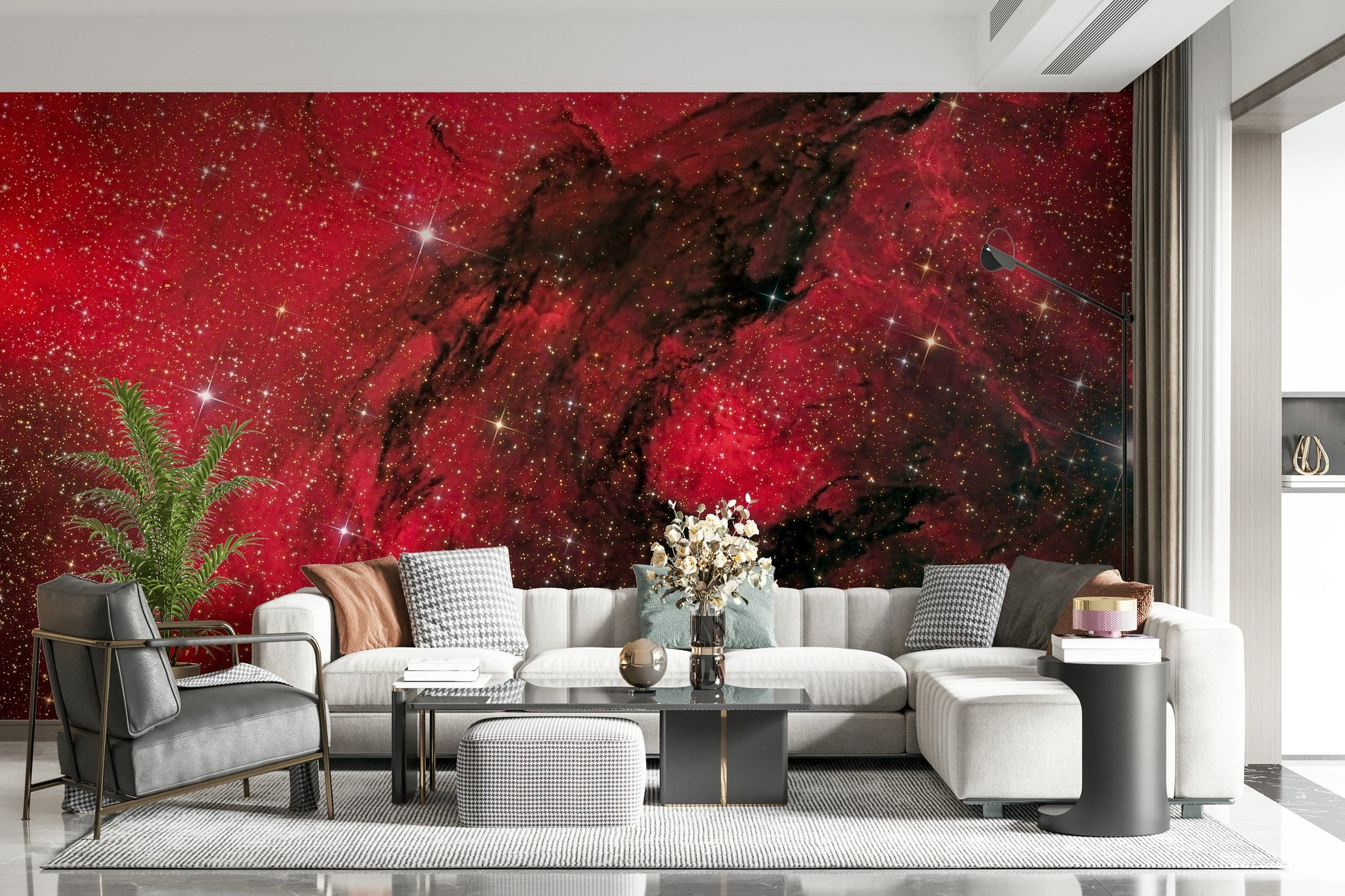 Cosmic Ember wallpaper mural with red cosmic clouds behind a cream sectional and gray armchair living room