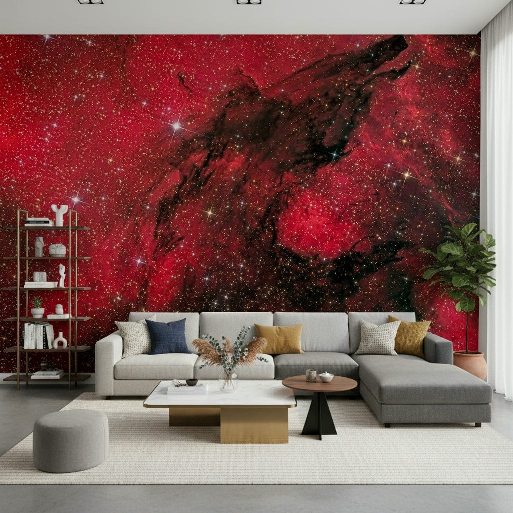 Cosmic Ember wallpaper mural of red starry space behind a gray sectional sofa and bookshelf in a living room