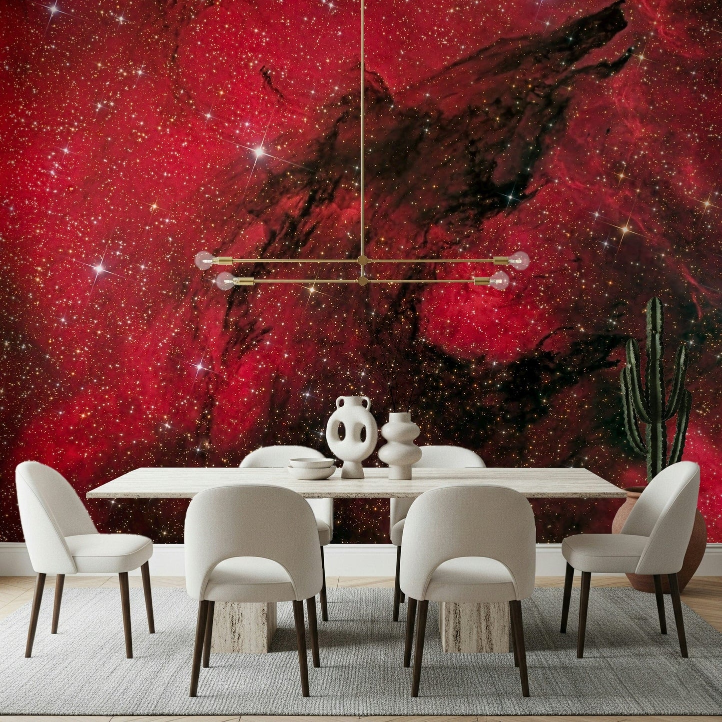 Cosmic Ember wallpaper mural in red starry nebula behind a white dining table and chairs with gold chandelier