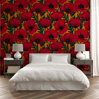 Bright red poppies on orange wallpaper design

