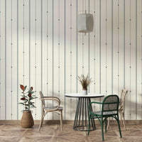 Minimalist striped wallpaper in buttercream and blue hues

