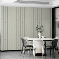 Soft stripes of buttercream and blue creating a serene atmosphere

