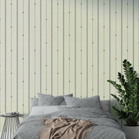 Soft, refined striped wallpaper with buttercream and blue tones

