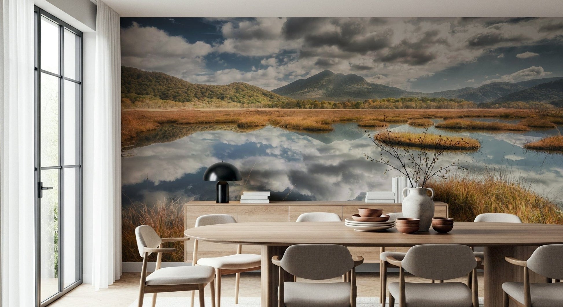 Lake and field wall mural complements dining space aesthetic