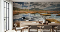Lake and field wall mural complements dining space aesthetic