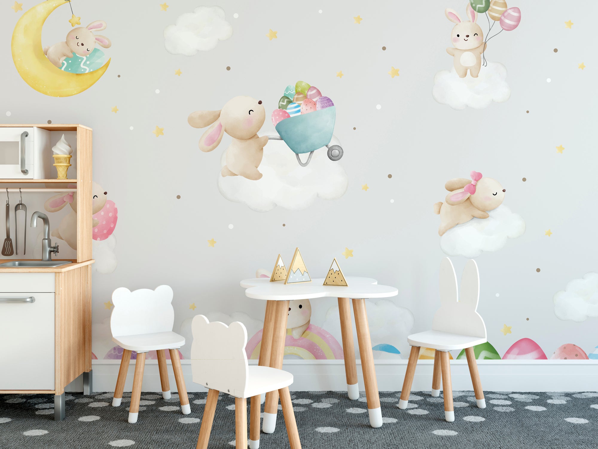Removable Pastel Bunny Easter wall mural with cloud-riding bunnies behind animal stools and a play kitchen