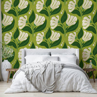 The background is a distinctive avocado green.
