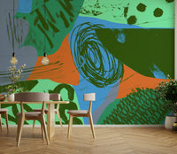 A graceful subtle pattern wall mural in cool, orange, and blue tones.

