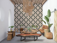 Geometric retro wallpaper with interlocking diamond shapes and subtle atomic star details.