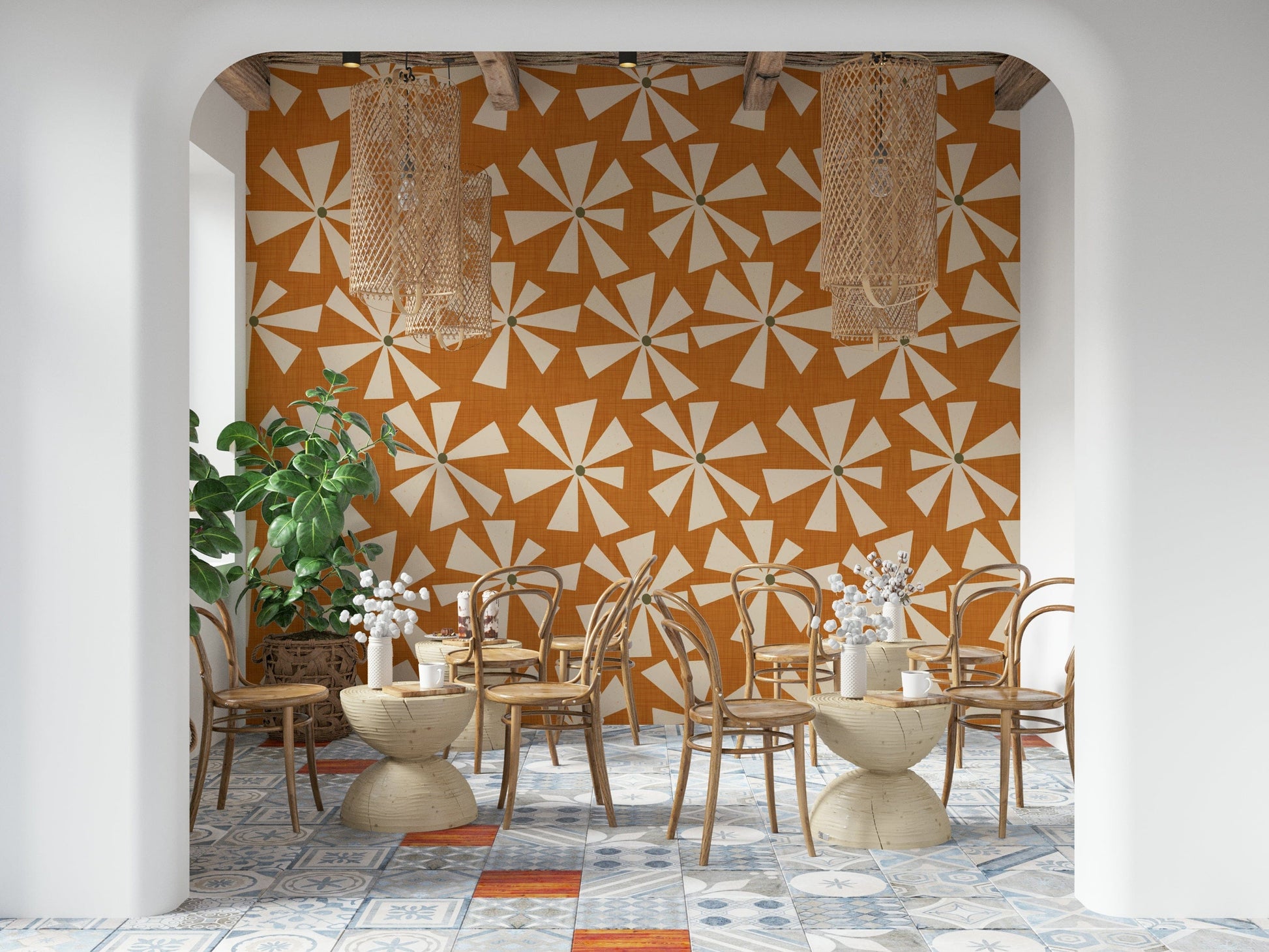 Patterned wallpaper showcasing mid-century pinwheel-style flowers in a vibrant warm palette.