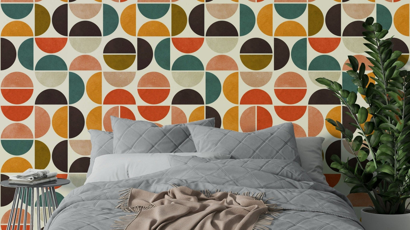 A retro-style wall mural with a repeating pattern of circles.

