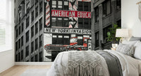 Building side covered in graphic phrases and images, excellent Retro City Murals.
