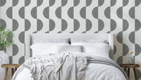 A retro-style wall mural with a dynamic echoing pattern.

