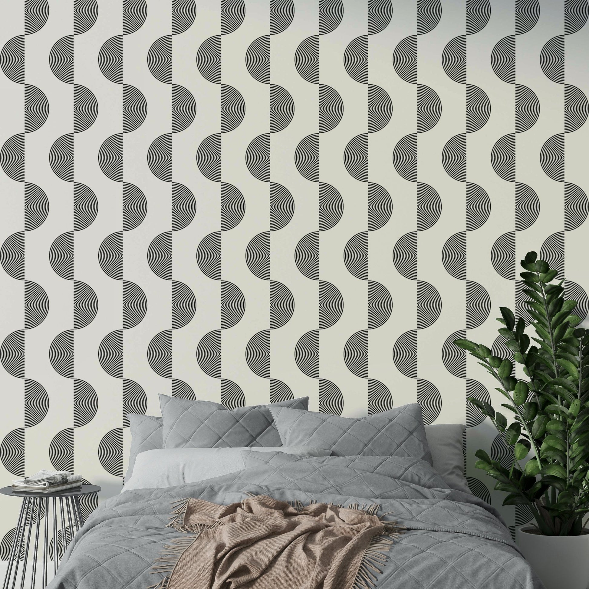 The wallpaper is applied seamlessly, giving the wall a uniform look.

