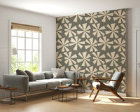 Vintage-inspired wallpaper showcasing geometric flower bursts in soft cream tones.