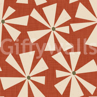 Soft geometric floral wallpaper with cream pinwheel motifs and a warm textured backdrop.