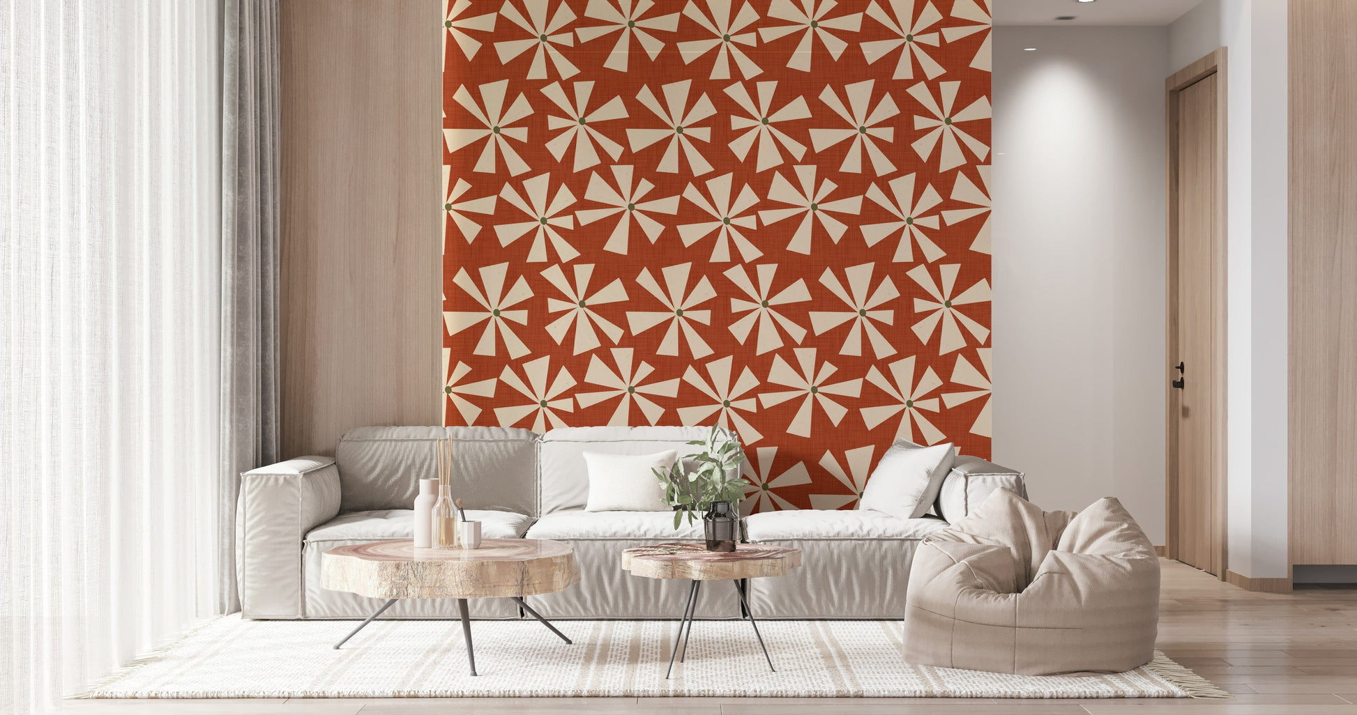 Patterned wallpaper with abstract cream blooms over a muted terracotta background.