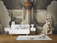 Retro Space Rocket wallpaper mural as a feature wall in a home office workspace in gray tones